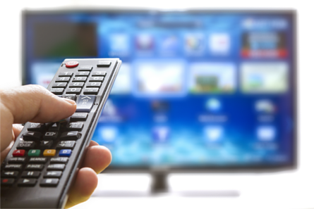 Left hand pointing remote control at TV screen