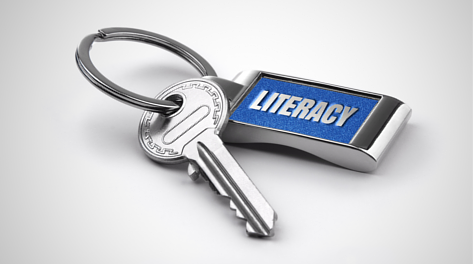 Key attached to keychain with the word 'literacy'
