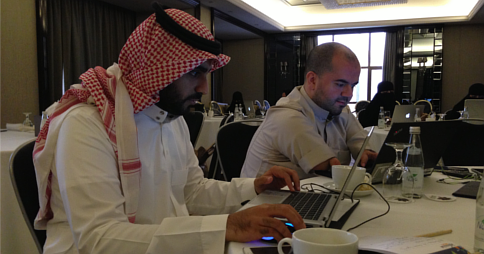 Saudi Arabian students of the Professional Certificate in Web Accessibility working on laptops Saudi Arabian students of the Professional Certificate in Web Accessibility working on laptops