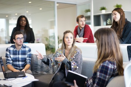 Image of six office workers in discussion