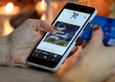 Woman online shopping on her smartphone